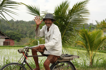 Bali man with bike says "Hello"