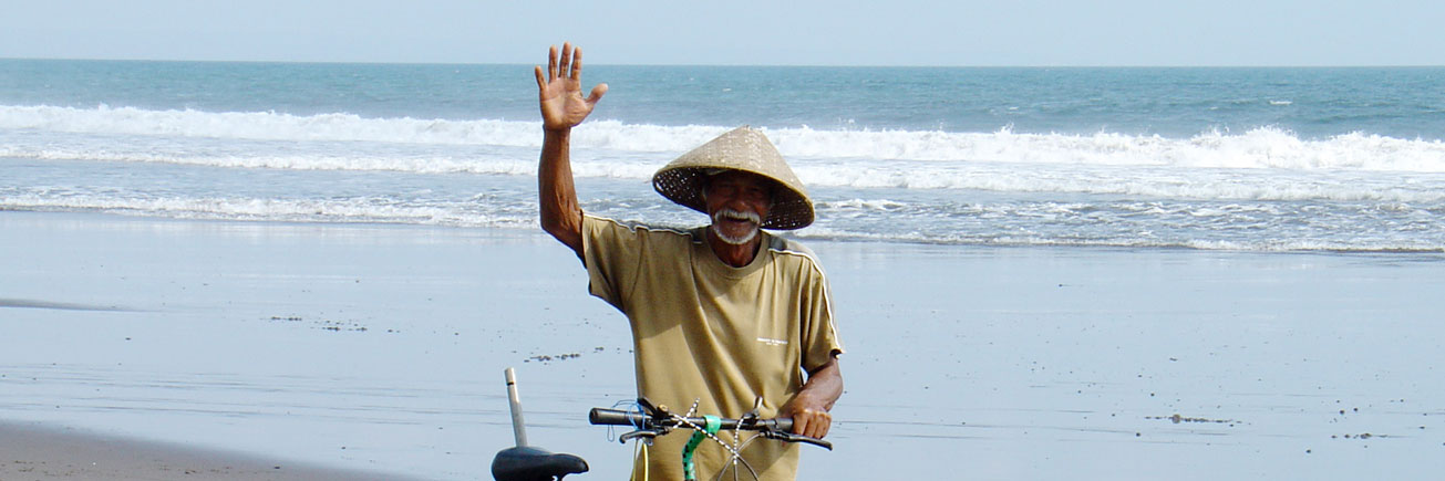 old man on the beach in West Bali
